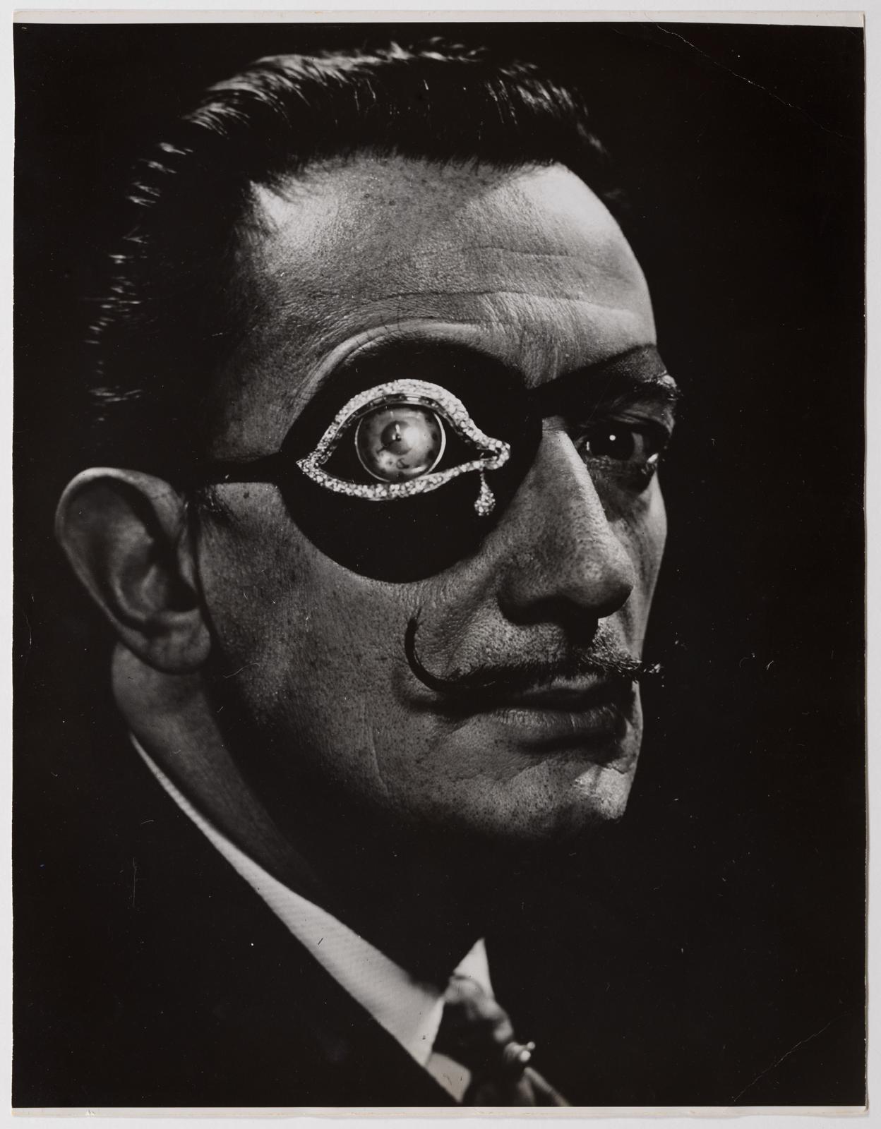 Salvador Dalí photographed by Philippe Halsman wearing The Eye of Time